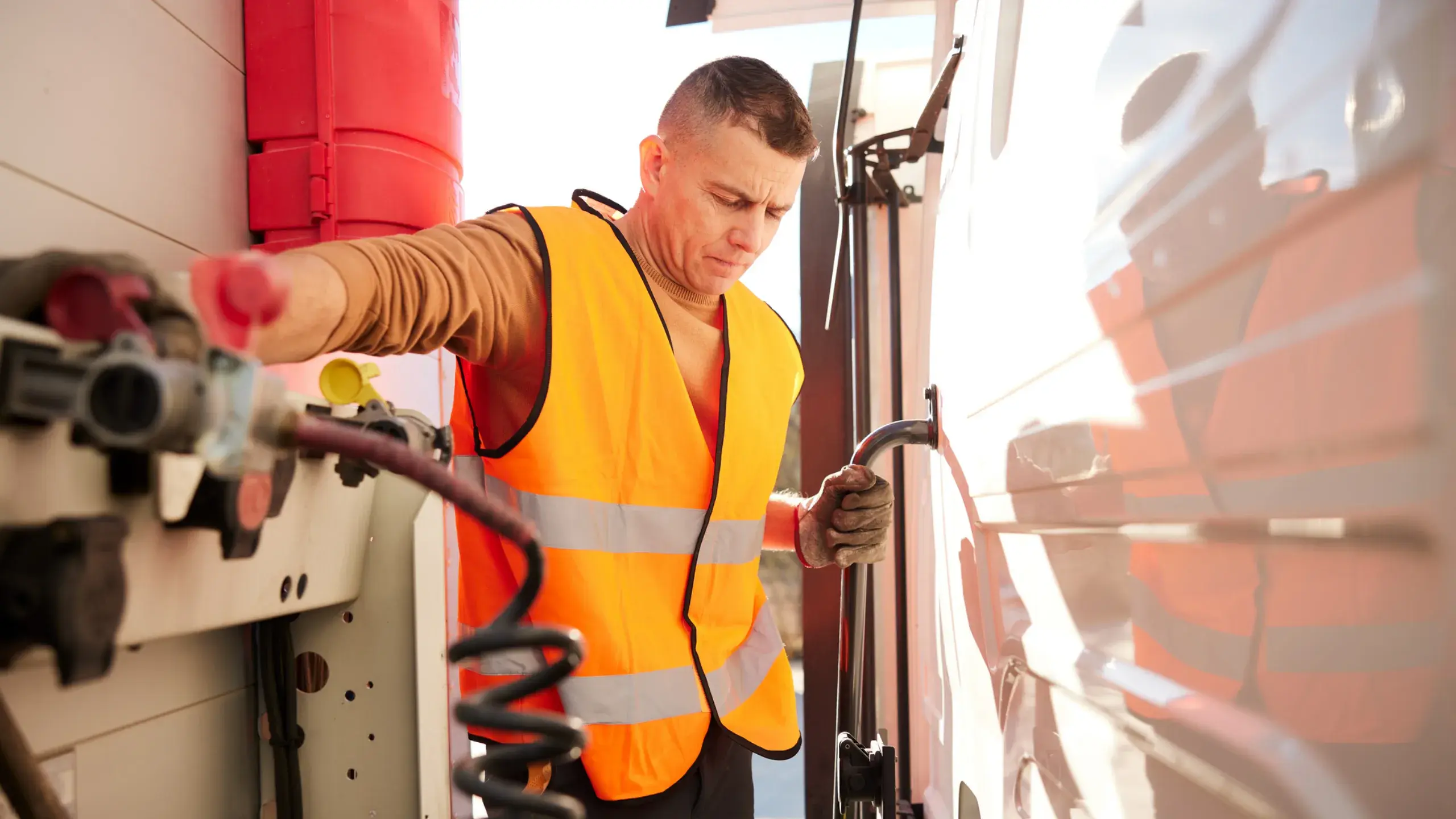 Truck driver doing a truck inspection before his drive