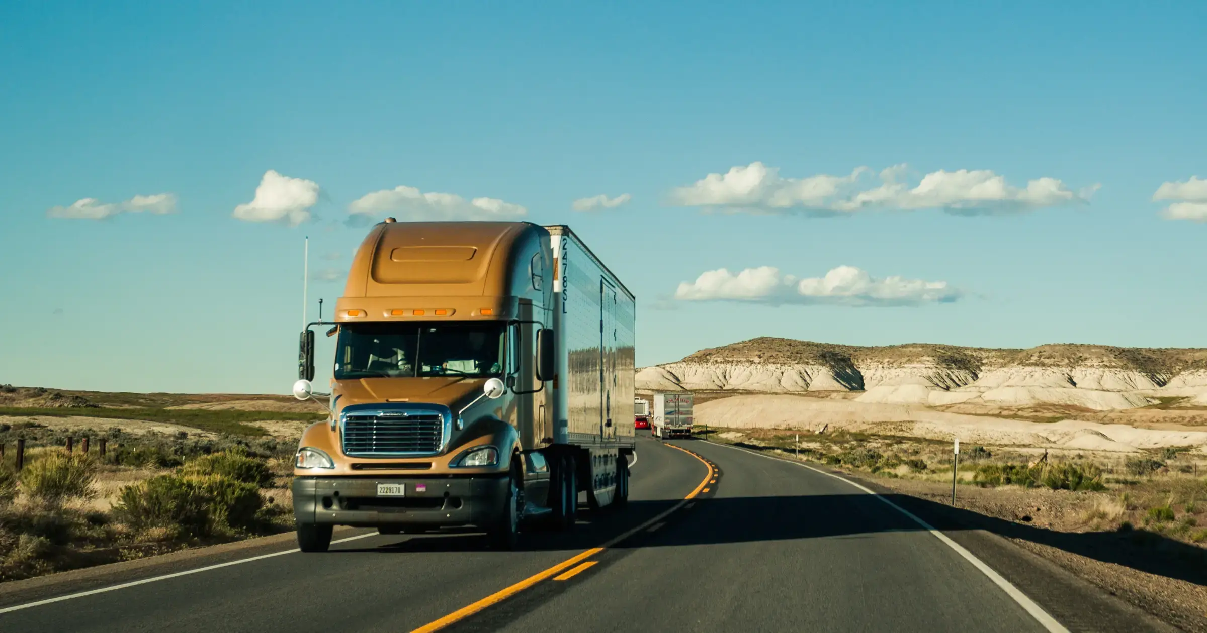 Trailer driving up the road